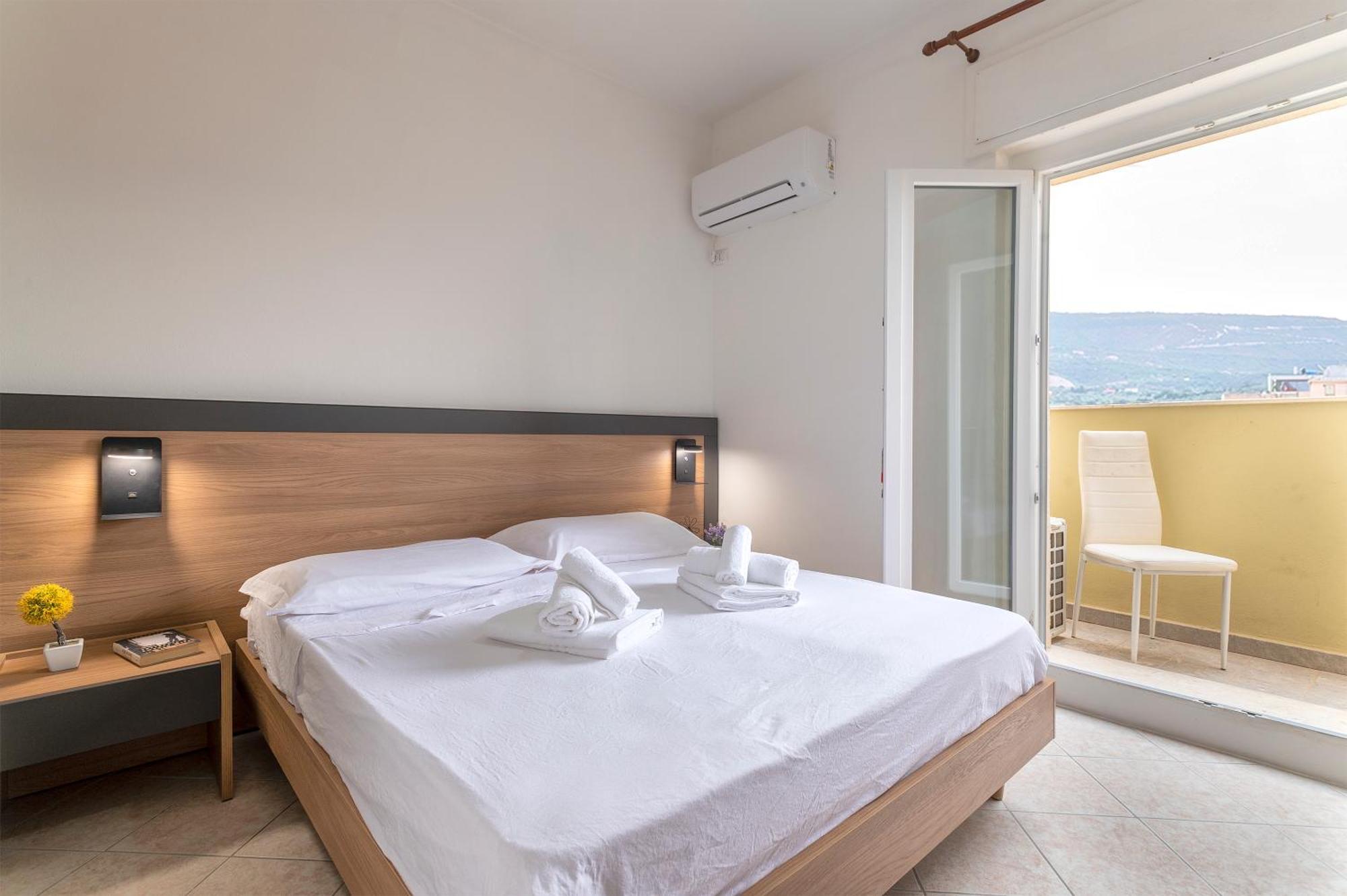 Oasis Guest House Alghero Bagian luar foto
