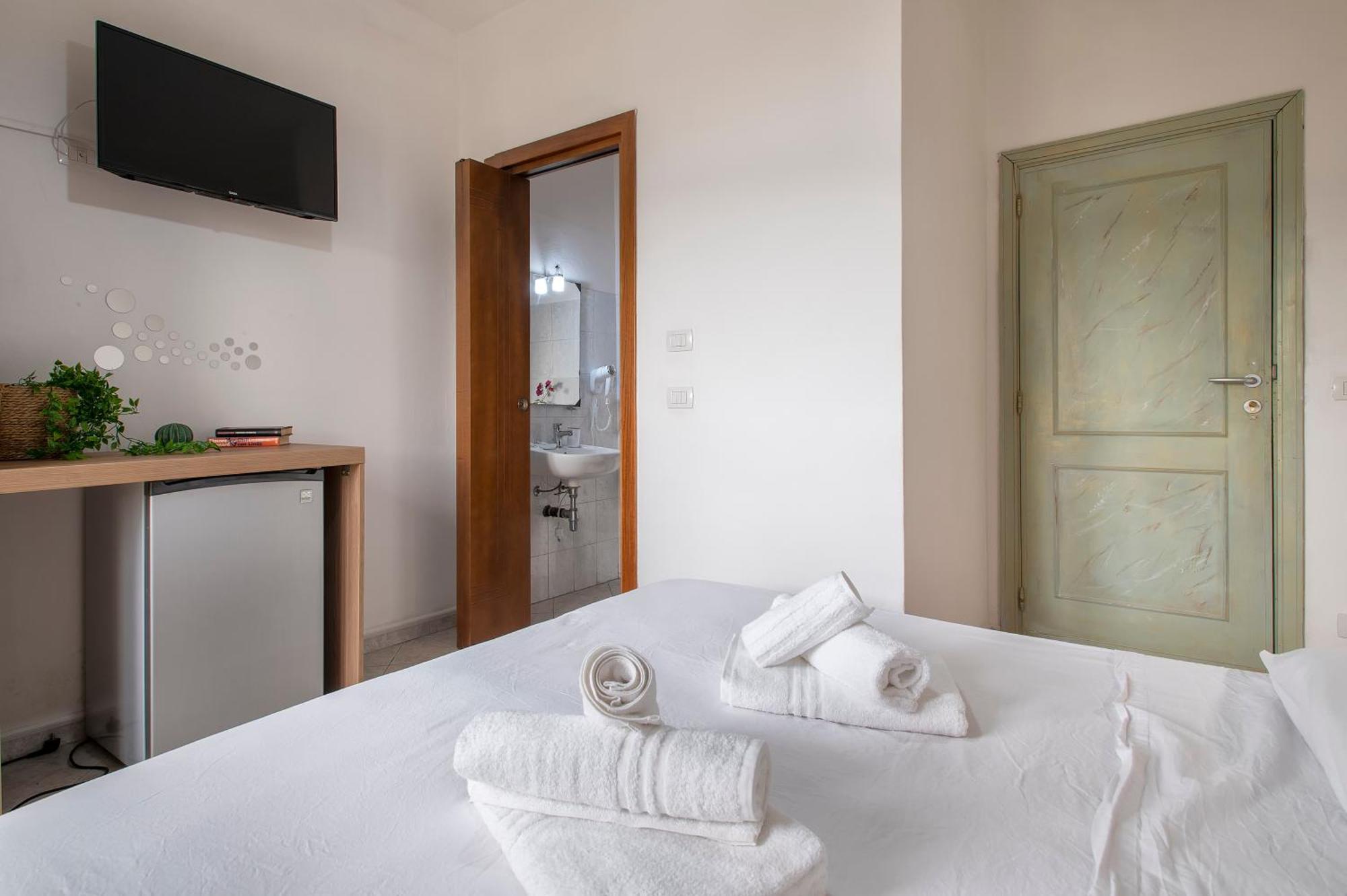 Oasis Guest House Alghero Bagian luar foto
