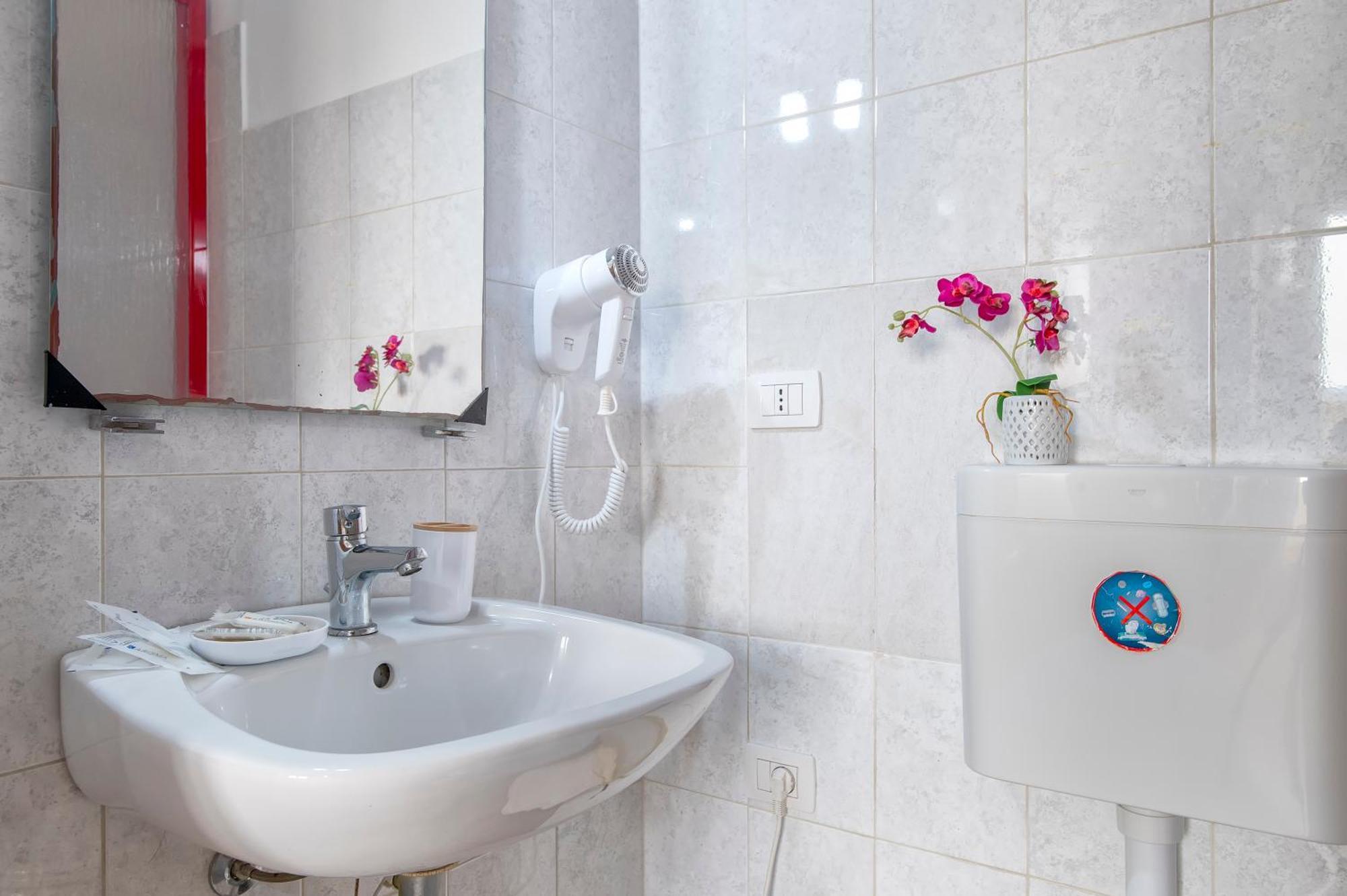 Oasis Guest House Alghero Bagian luar foto