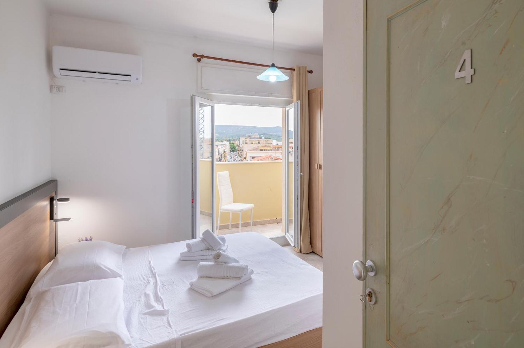 Oasis Guest House Alghero Bagian luar foto