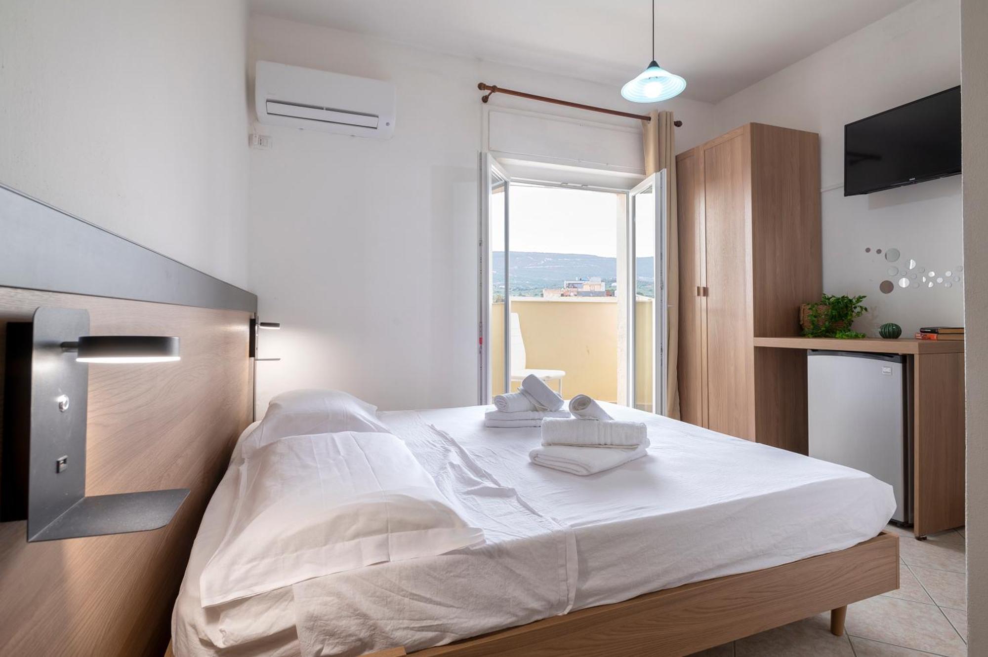 Oasis Guest House Alghero Bagian luar foto