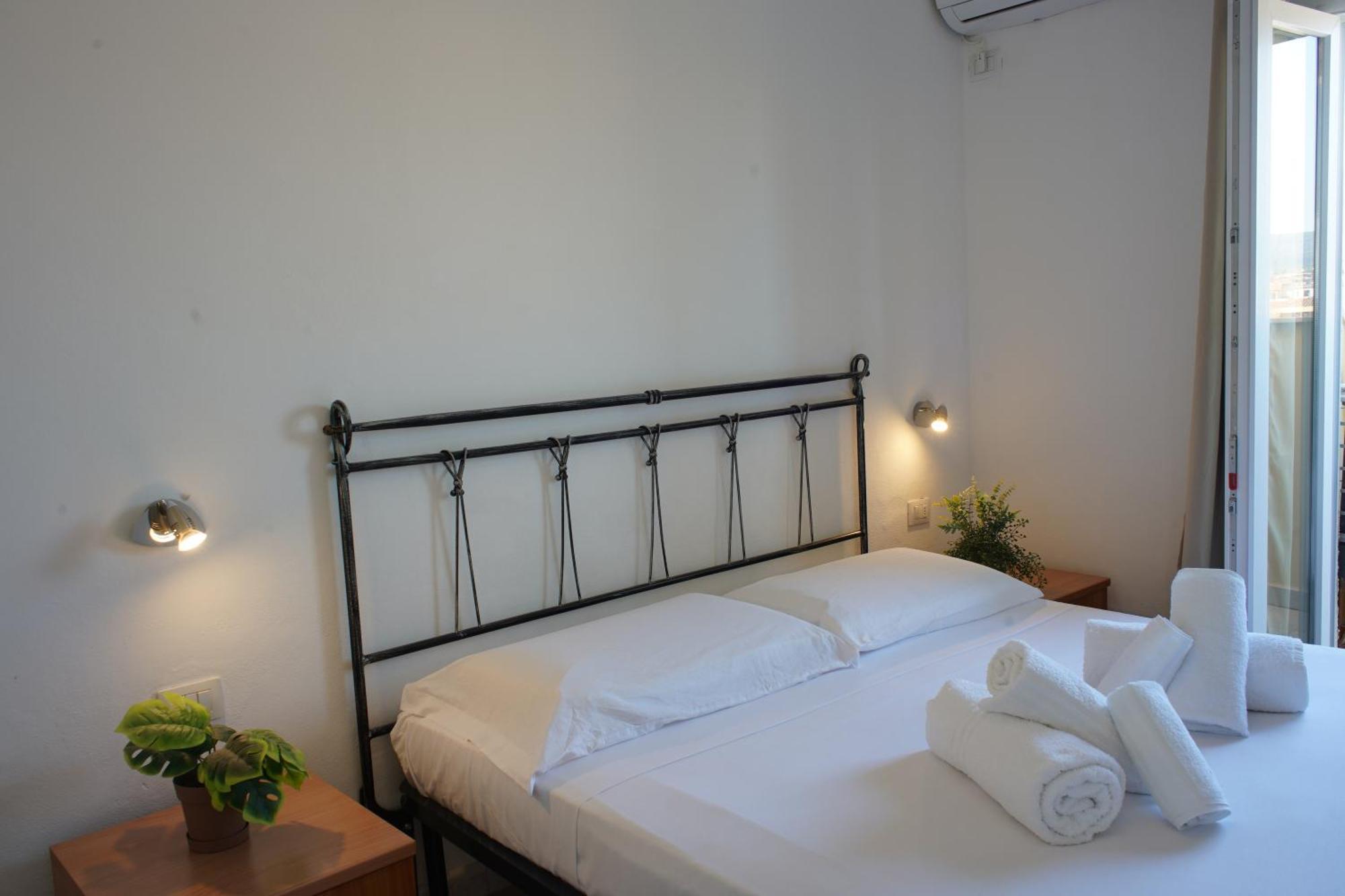 Oasis Guest House Alghero Bagian luar foto