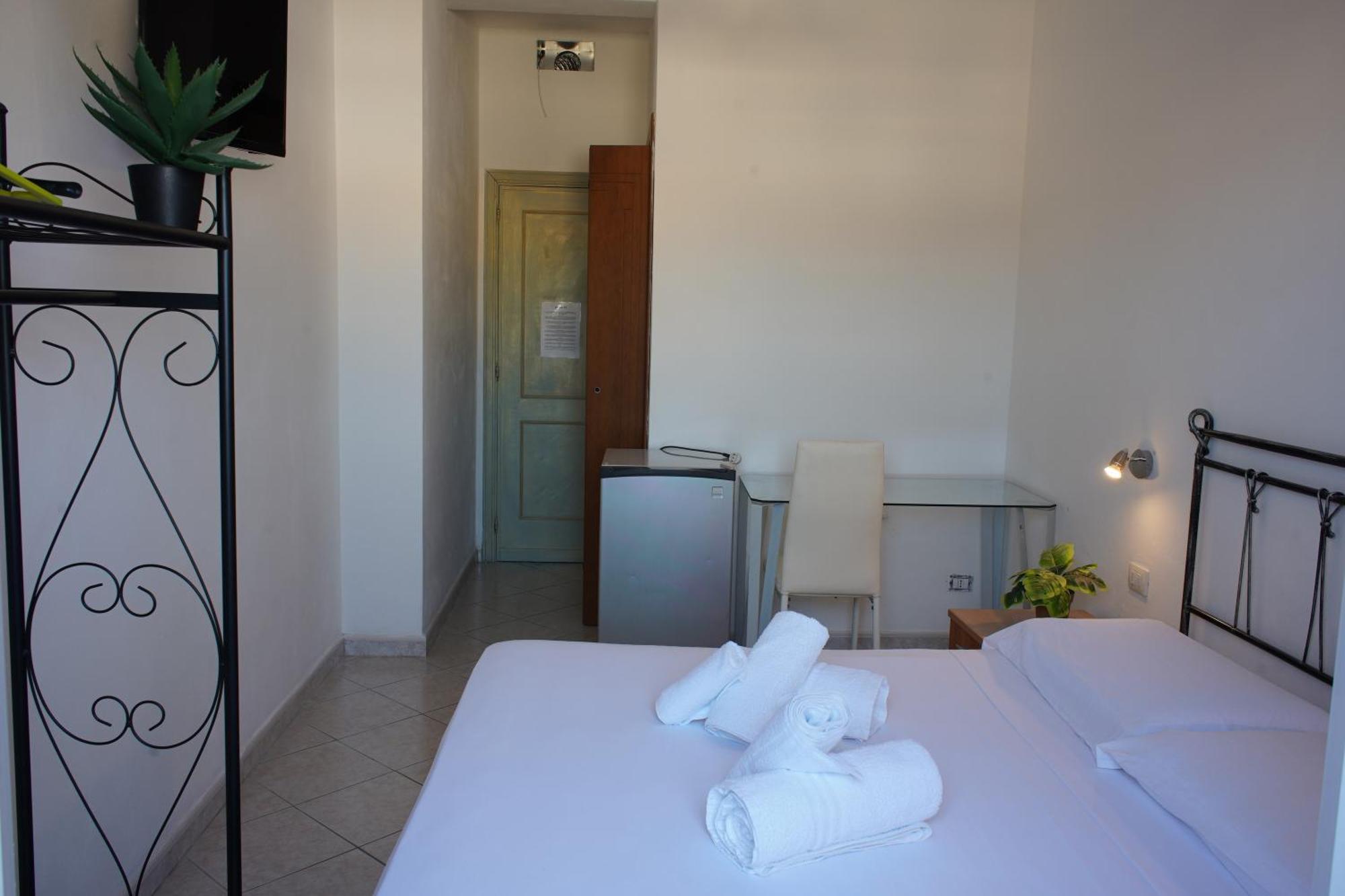 Oasis Guest House Alghero Bagian luar foto
