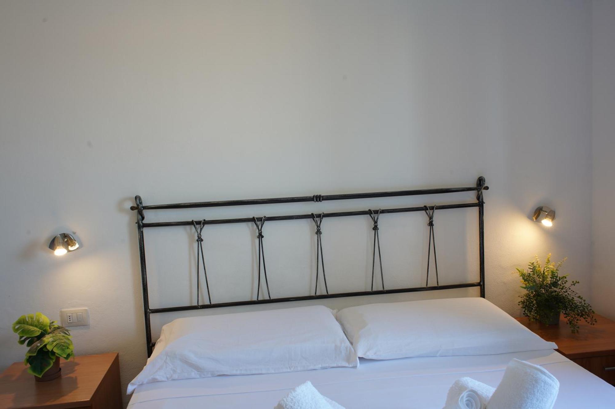 Oasis Guest House Alghero Bagian luar foto