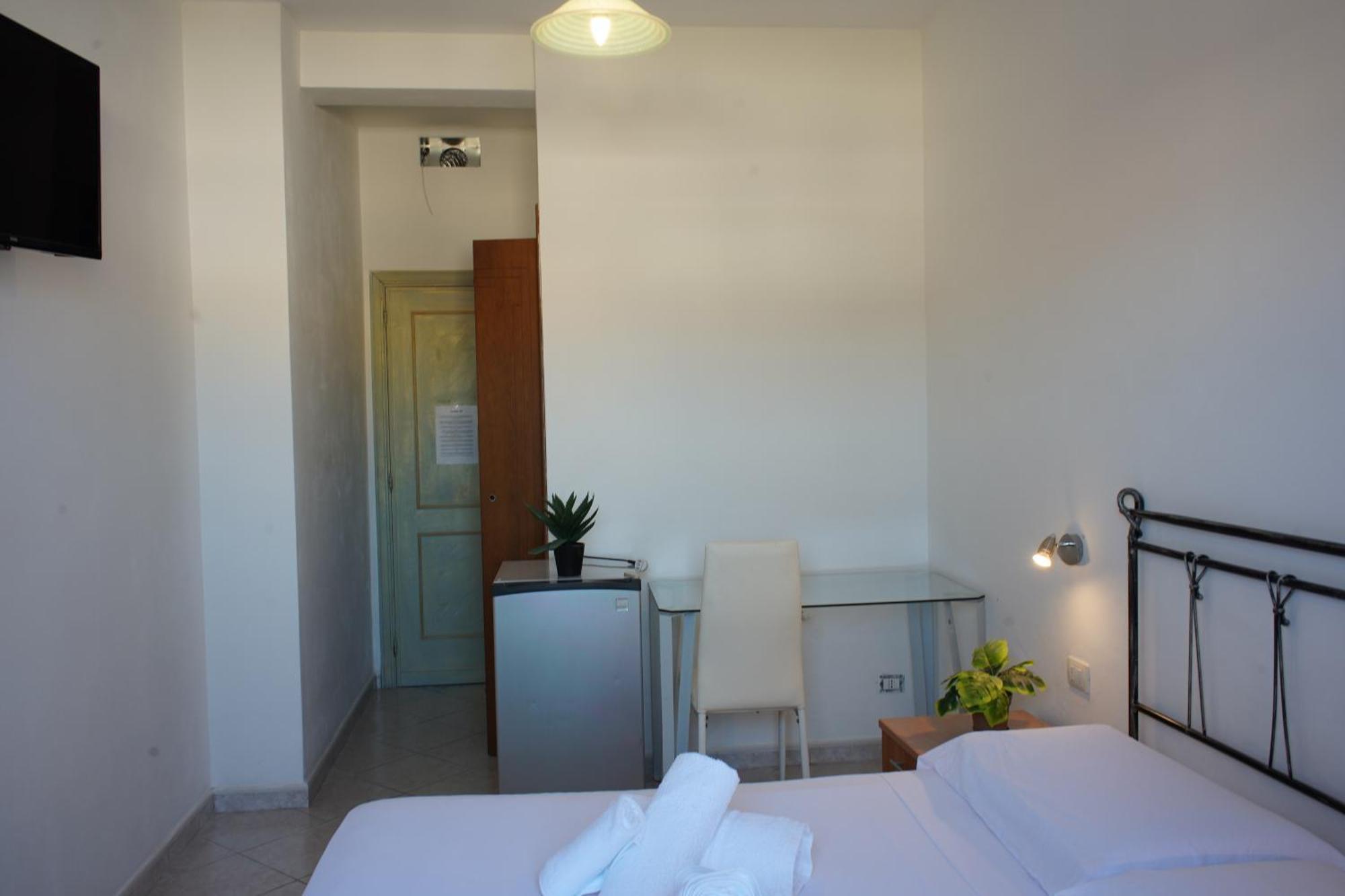 Oasis Guest House Alghero Bagian luar foto