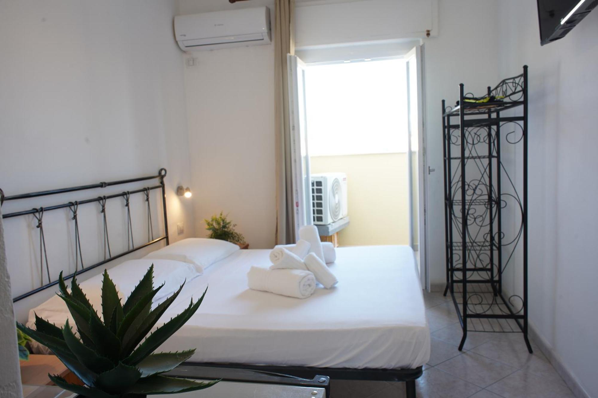 Oasis Guest House Alghero Bagian luar foto