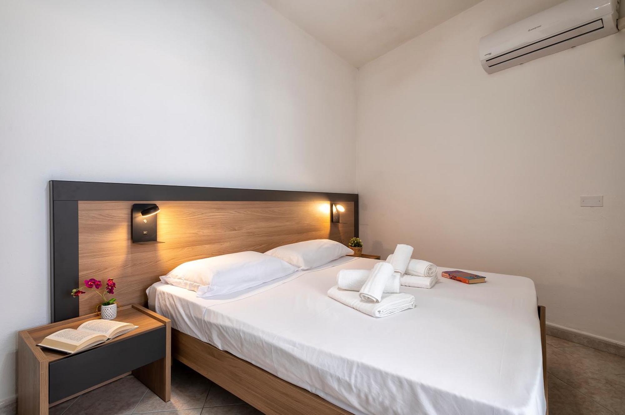 Oasis Guest House Alghero Bagian luar foto