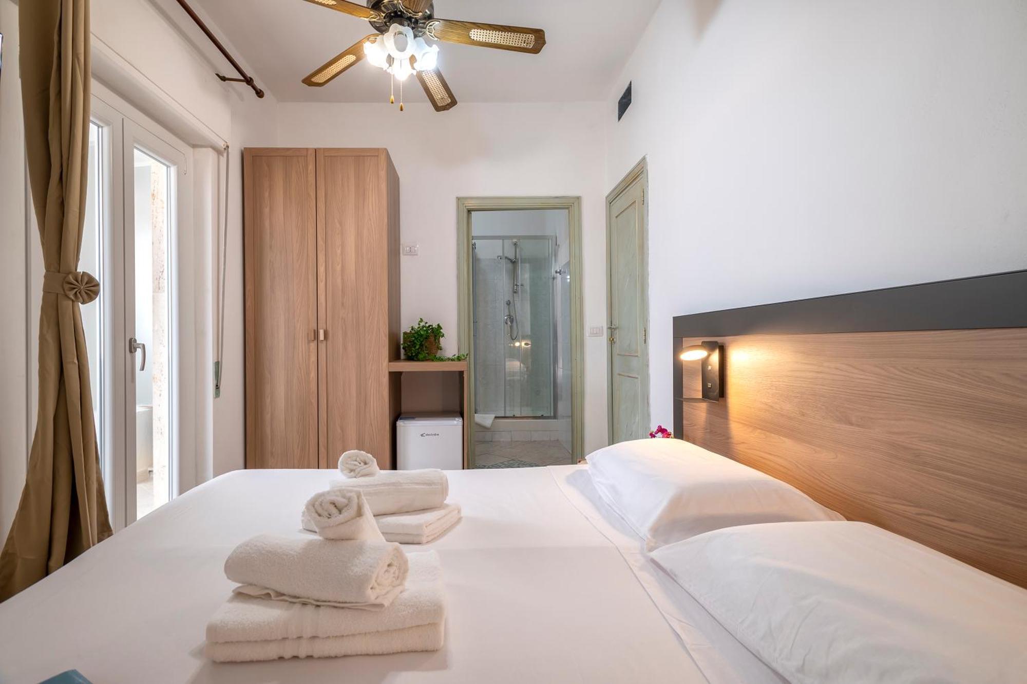 Oasis Guest House Alghero Bagian luar foto