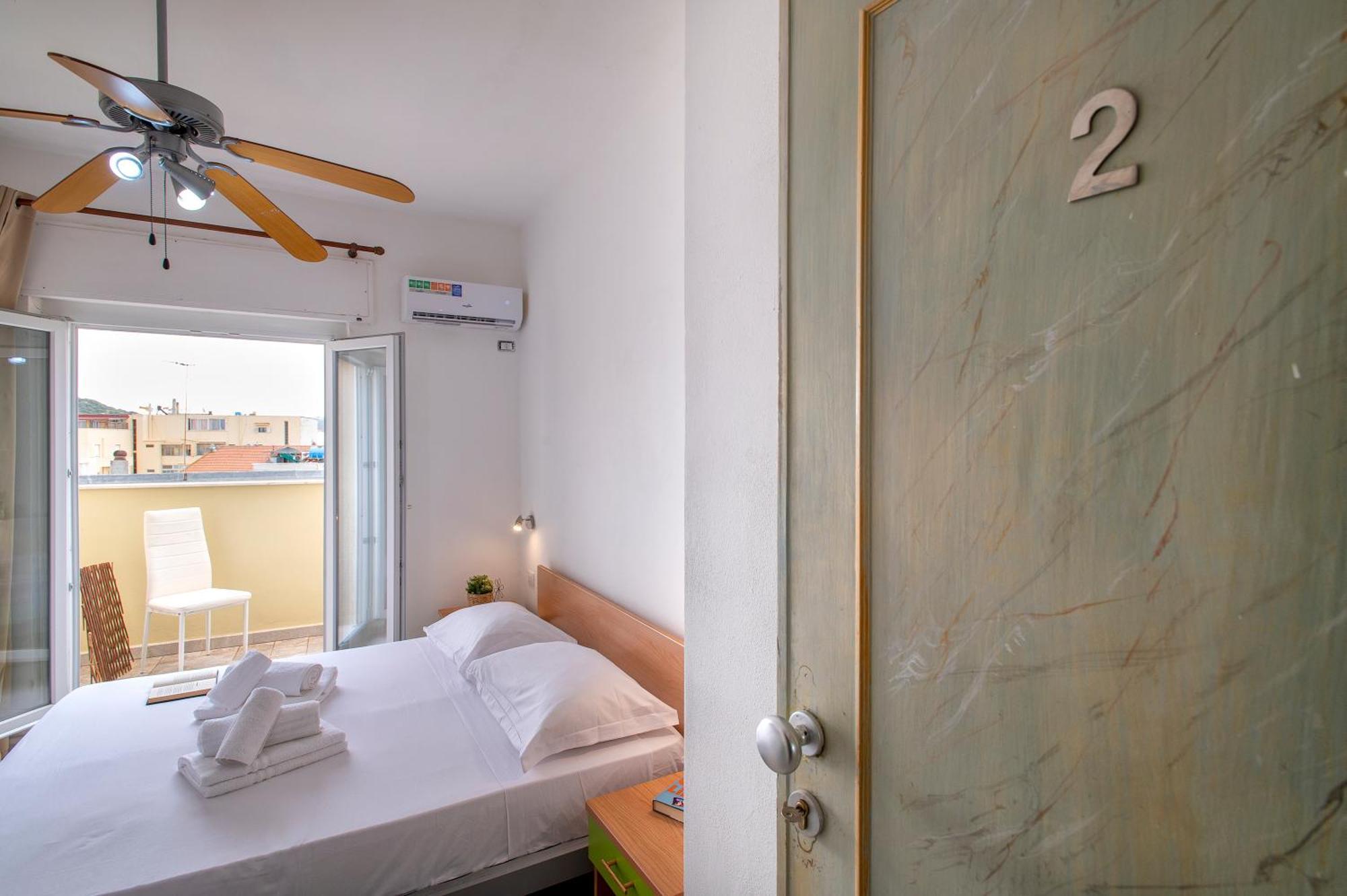 Oasis Guest House Alghero Bagian luar foto
